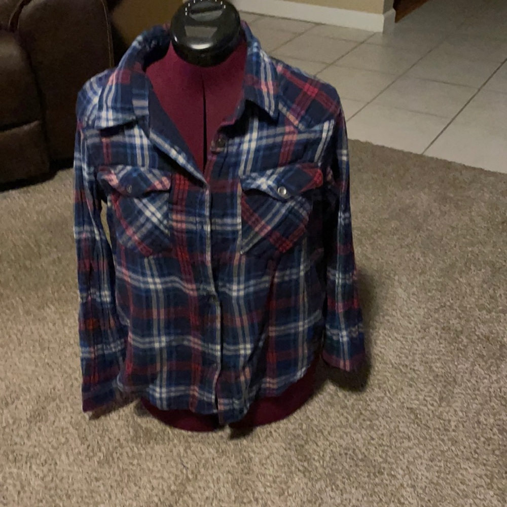 Woman’s red white and blue plaid flannel button up  shirtsize large